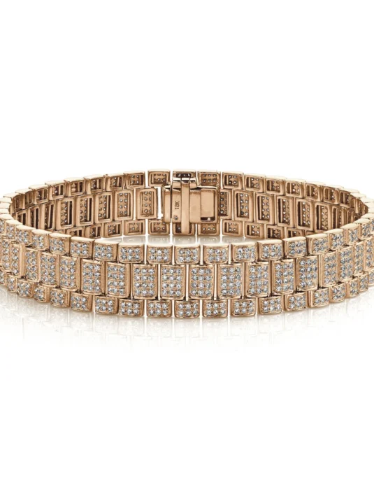 Bracelet en or rose 18 carats serti de diamants pavés, présentant plusieurs rangées de diamants brillants sertis sur des maillons