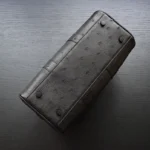 Black ostrich duffle bag