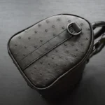 Black ostrich duffle bag