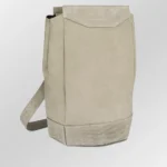 Beige crocodile leather backpack with nubuck suede construction and adjustable shoulder strap