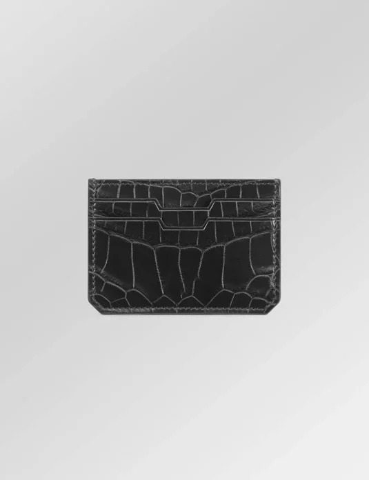 Black crocodile leather card holder displaying natural scale texture and multiple card slots