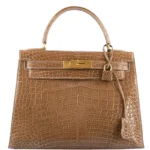 Brown crocodile handbag Kelly style with gold hardware and structured silhouette