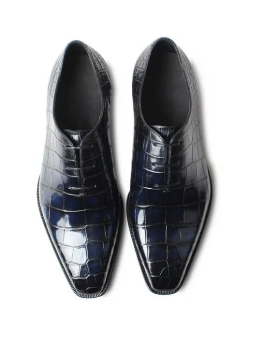 Black crocodile leather dress shoes with glossy finish and rectangular scale pattern displayed from top and side view
