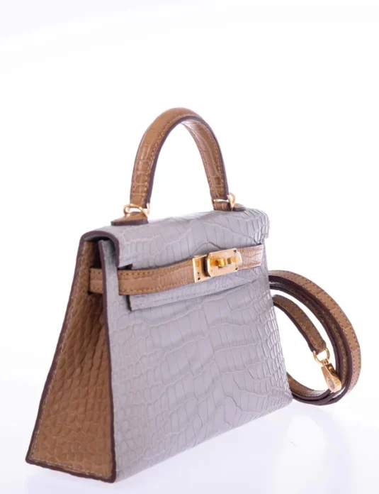 Grey alligator clutch bag with Kelly pochette design featuring brown leather trim and gold hardware
