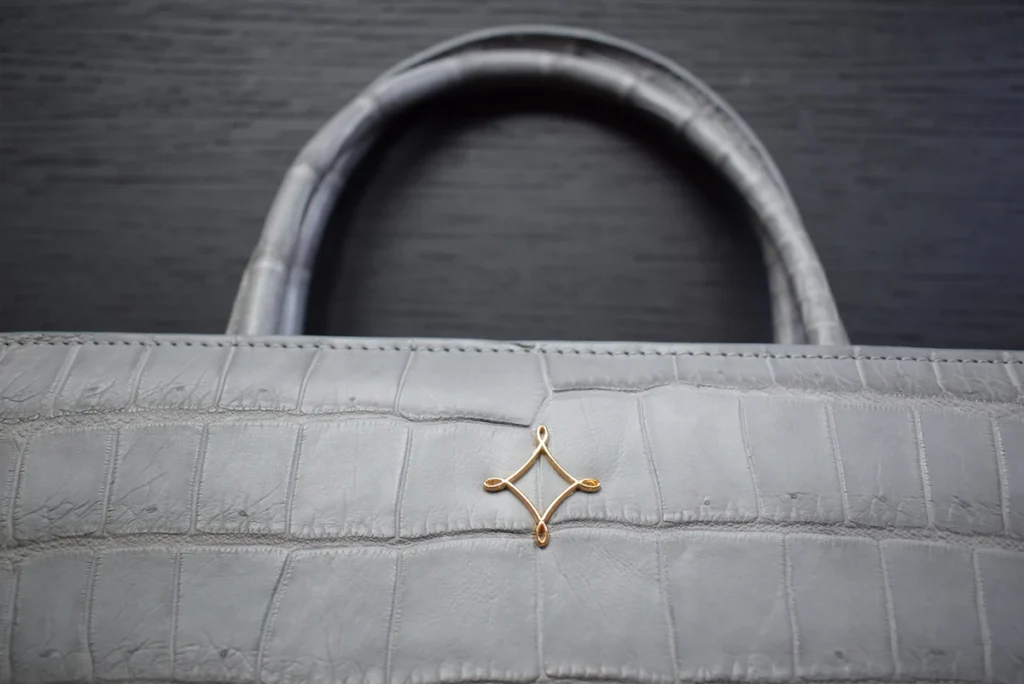 Grey crocodile tote handbag logo metal