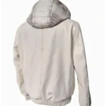 Back view of a light beige hooded jacket with a textured crocodile-pattern hood detail, against a plain white background.