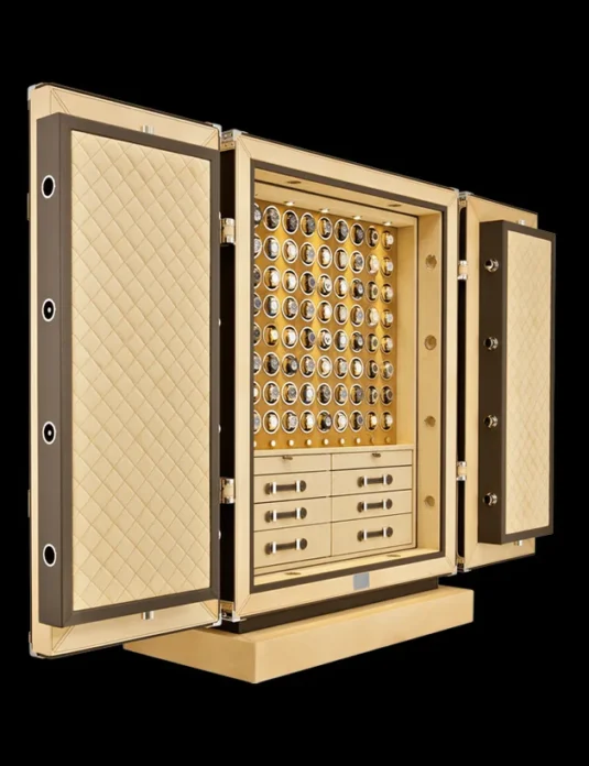 Coffre-fort à montres en cuir avec intérieur matelassé, plusieurs emplacements pour montres et compartiments en quincaillerie dorée