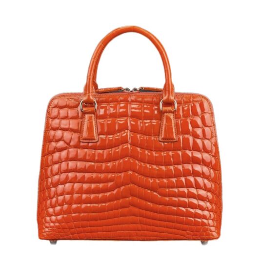 Orange alligator handbag