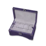 Purple crocodile watch box with grey velvet interior compartments and luxury metal hardware
