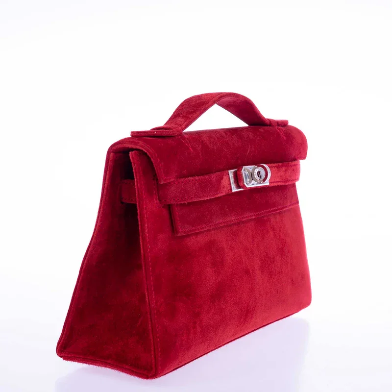红色麂皮凯莉手拿包，18k白金侧边