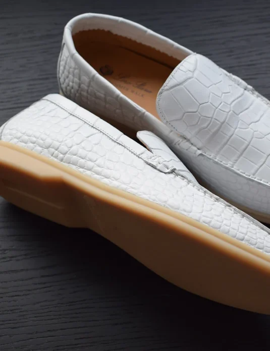 White crocodile leather loafers handcrafted with textured exotic skin and slip-on design