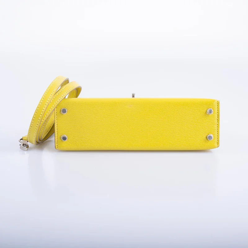 黄色皮革迷你手提包 Kelly 包，底部直径 20 厘米