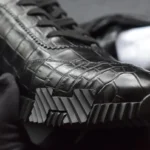 Black crocodile bouncing sneakers