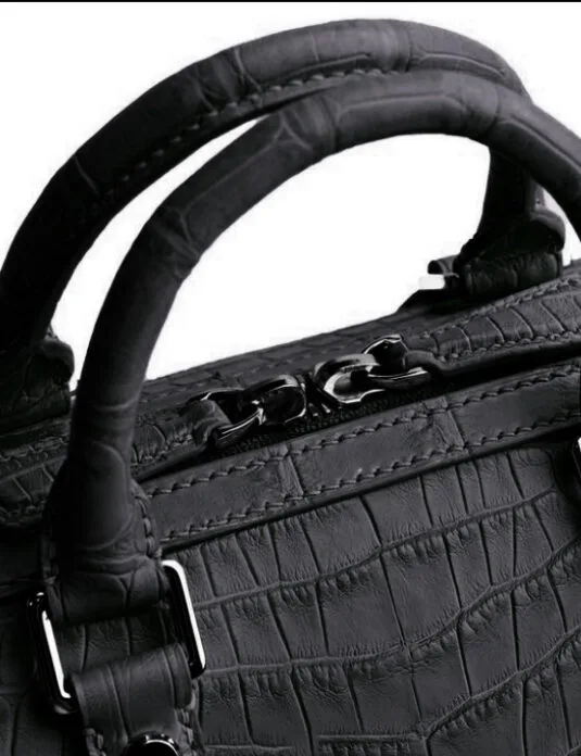Black crocodile duffle