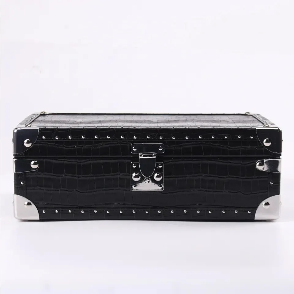 black crocodile embossed leather trunk front