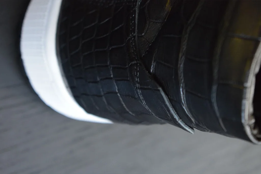 black crocodile sneaker back