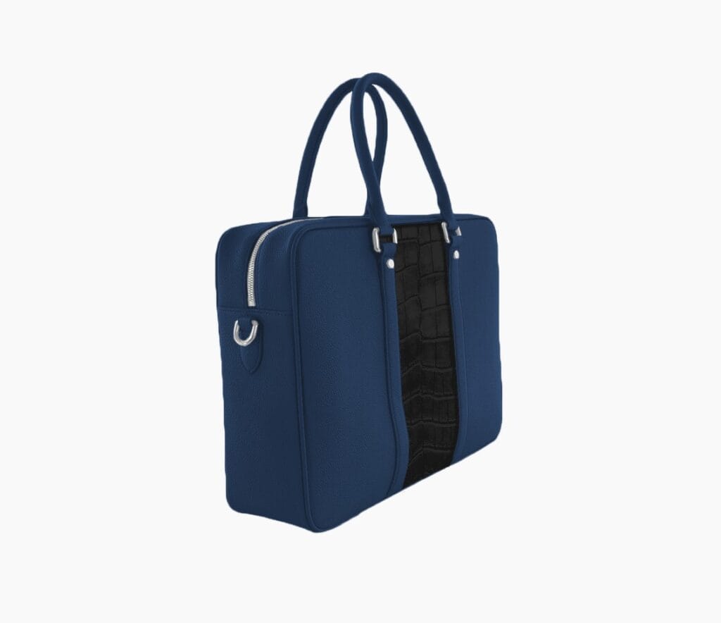 blaue Ledertasche mit schwarzer Krokodilprägung