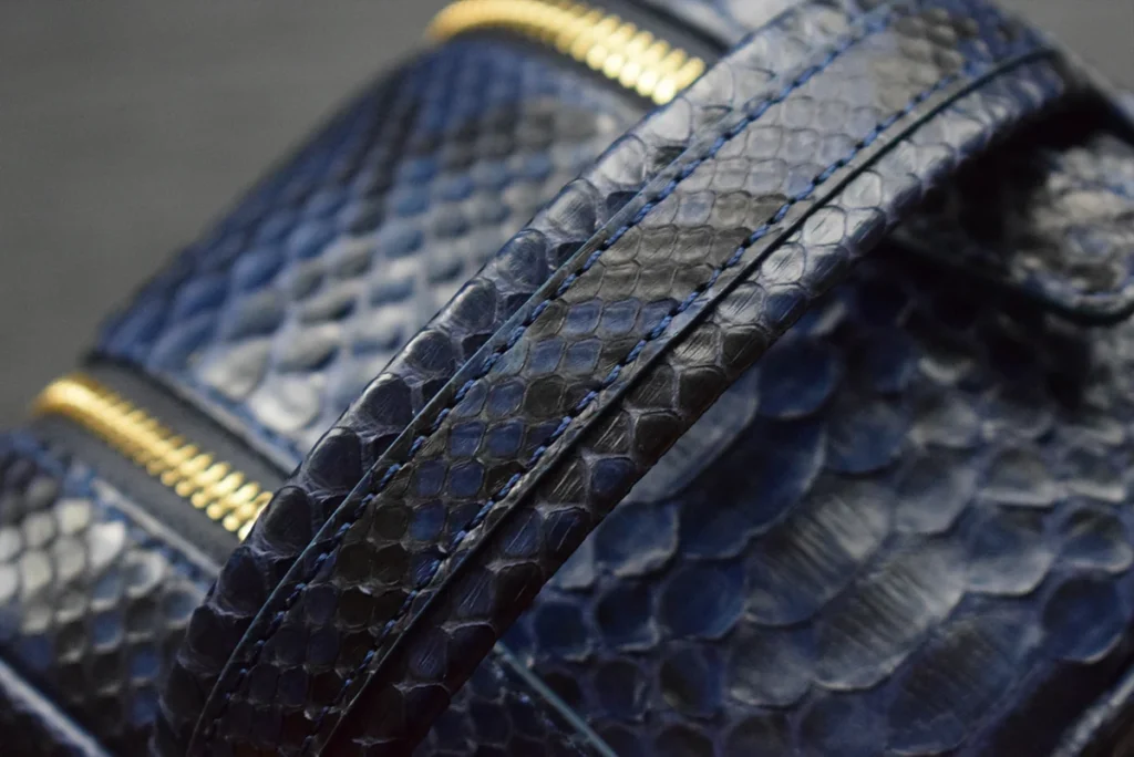 blue python toiletry bag