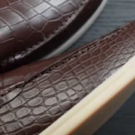 Brown crocodile loafer shoes