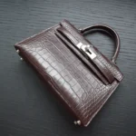 Mini borsa Kelly in pelle di coccodrillo marrone, borsa di lusso realizzata a mano con chiusura a girello