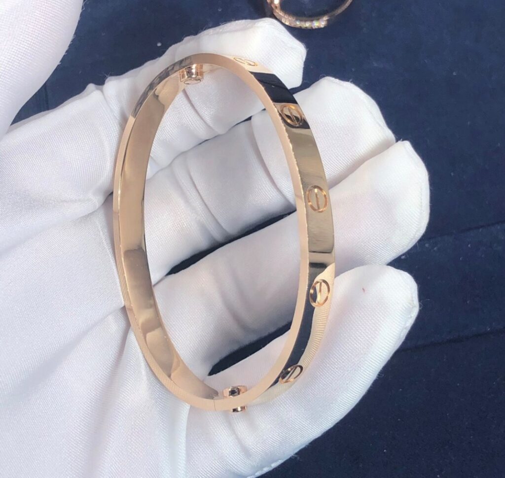 cartier 18k yellow gold and diamond love bracelet 10