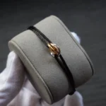 Cord bracelet trinity gold