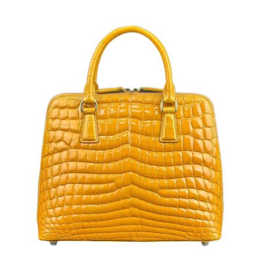 glossy yellow crocodile handbag