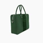 grüne Ledertasche mit schwarzem Krokodil