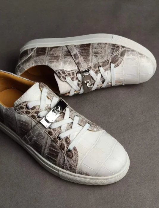 Himalayan crocodile leather sneakers with white to grey ombré pattern and white rubber soles