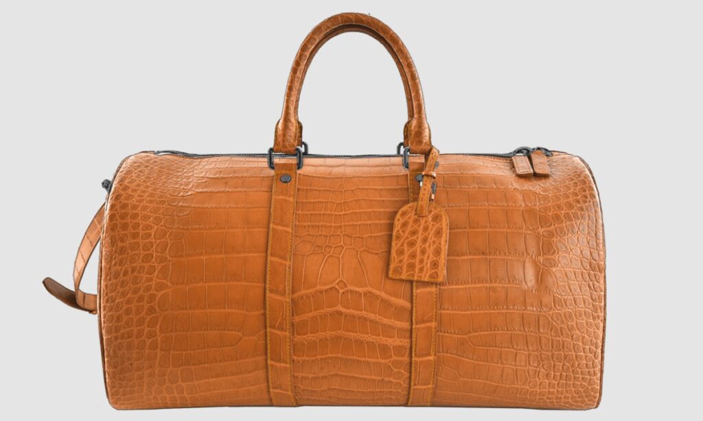 orange crocodile duffle bag lv design