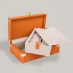 Uhrenbox aus orangefarbenem Leder in Togo-Optik mit 8 Fächern