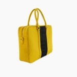 gelbe Ledertasche mit schwarzem Krokodil